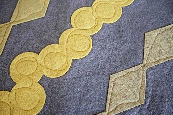 Bold Pieces for Inspired Spaces 1 Egg and dart table runner pattern in light yellow and blue